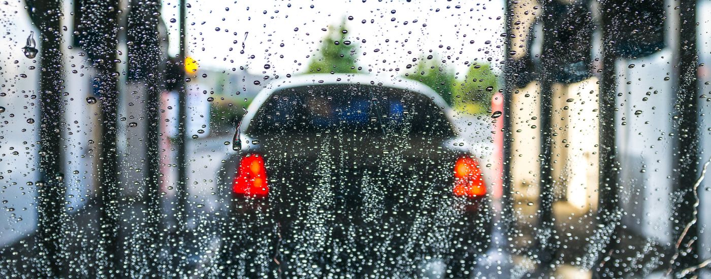 Rear shot of a vehicle going through a car wash