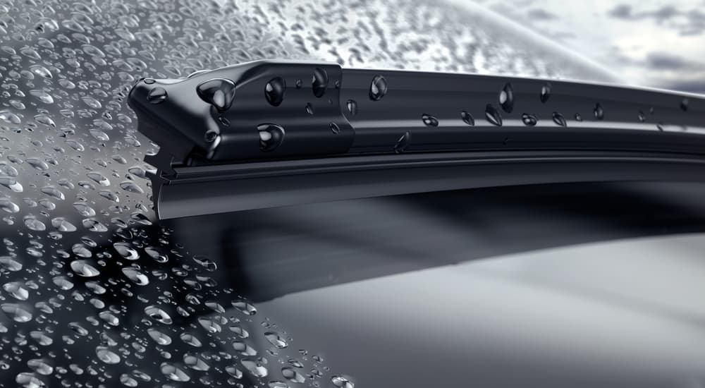 Close-up on a car's windshield wipers.