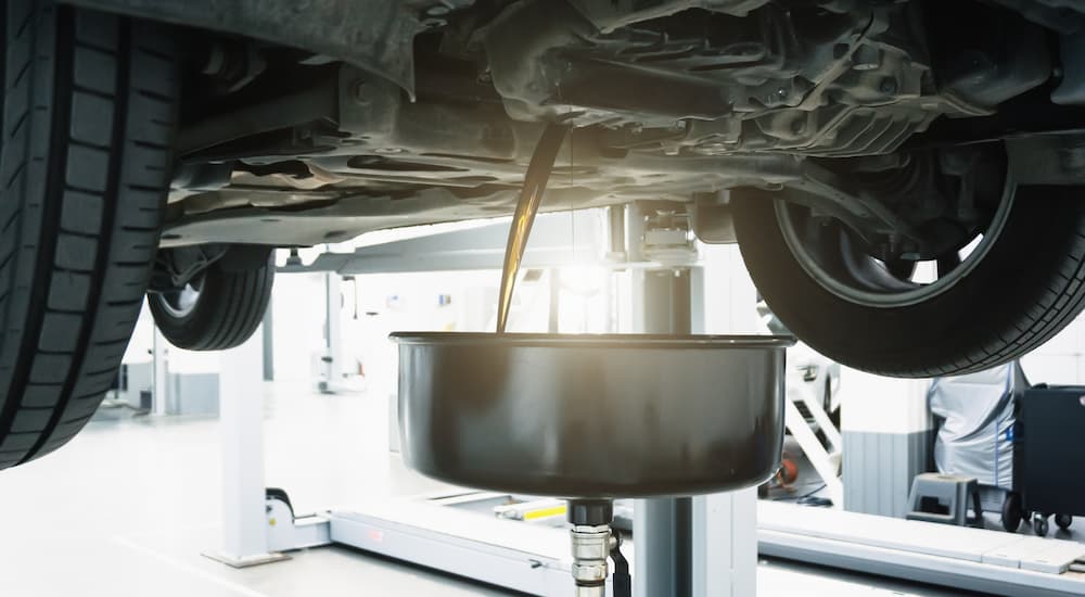 Oil draining into an oil pan